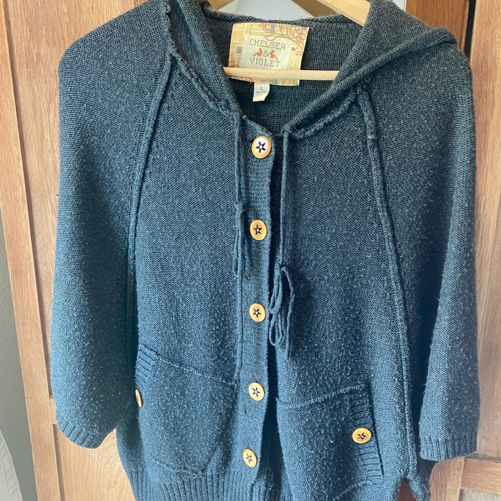 Sweater with hoodie.